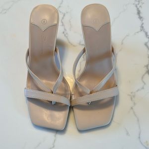 Tan kitten heals. Super comfy just not what I needed. Never worn.